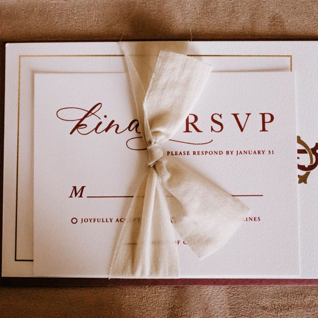 RSVP card with ribbon.