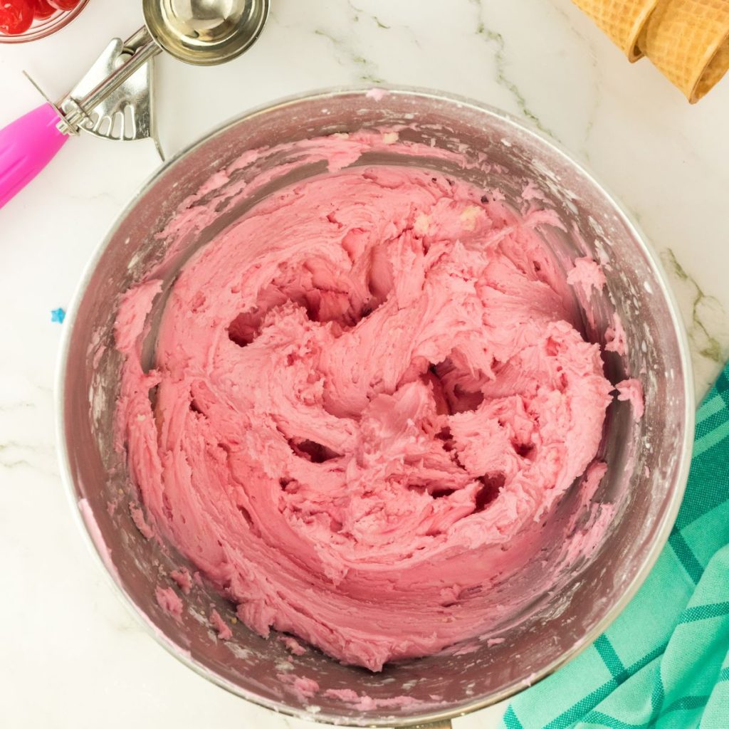 Bowl with pink frosting. 