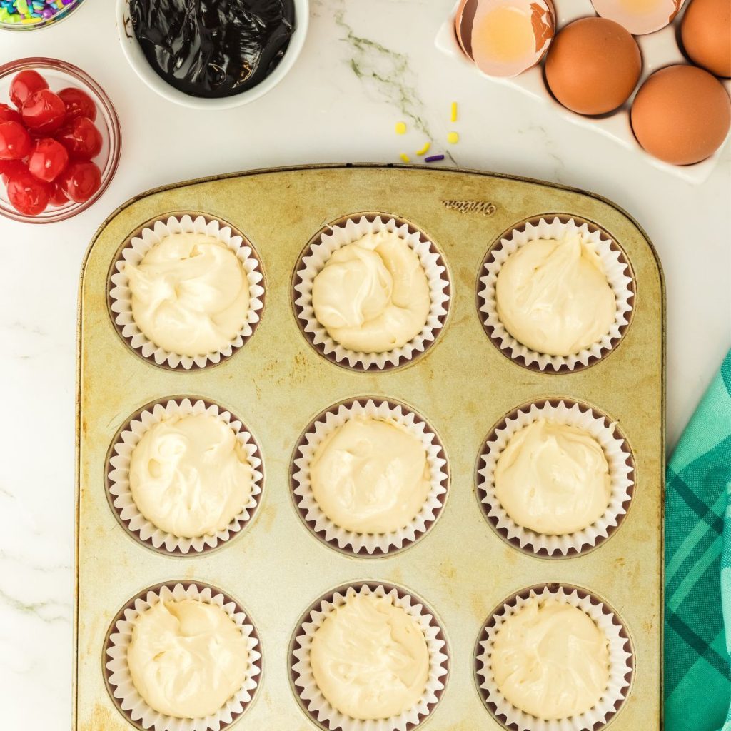 Batter in muffin tin.