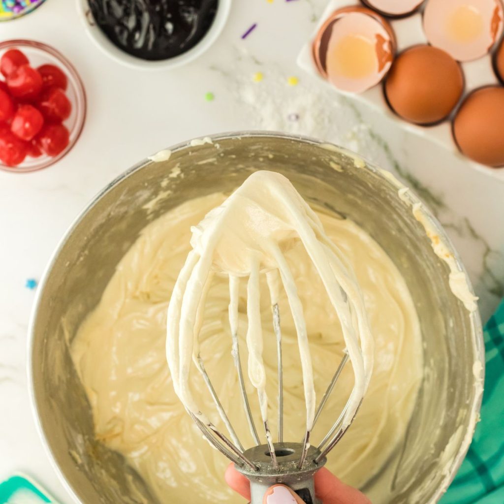 Cake batter on a beater.