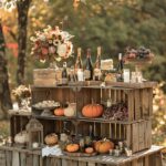 Wooden crates with pumpkins and wine bottles.