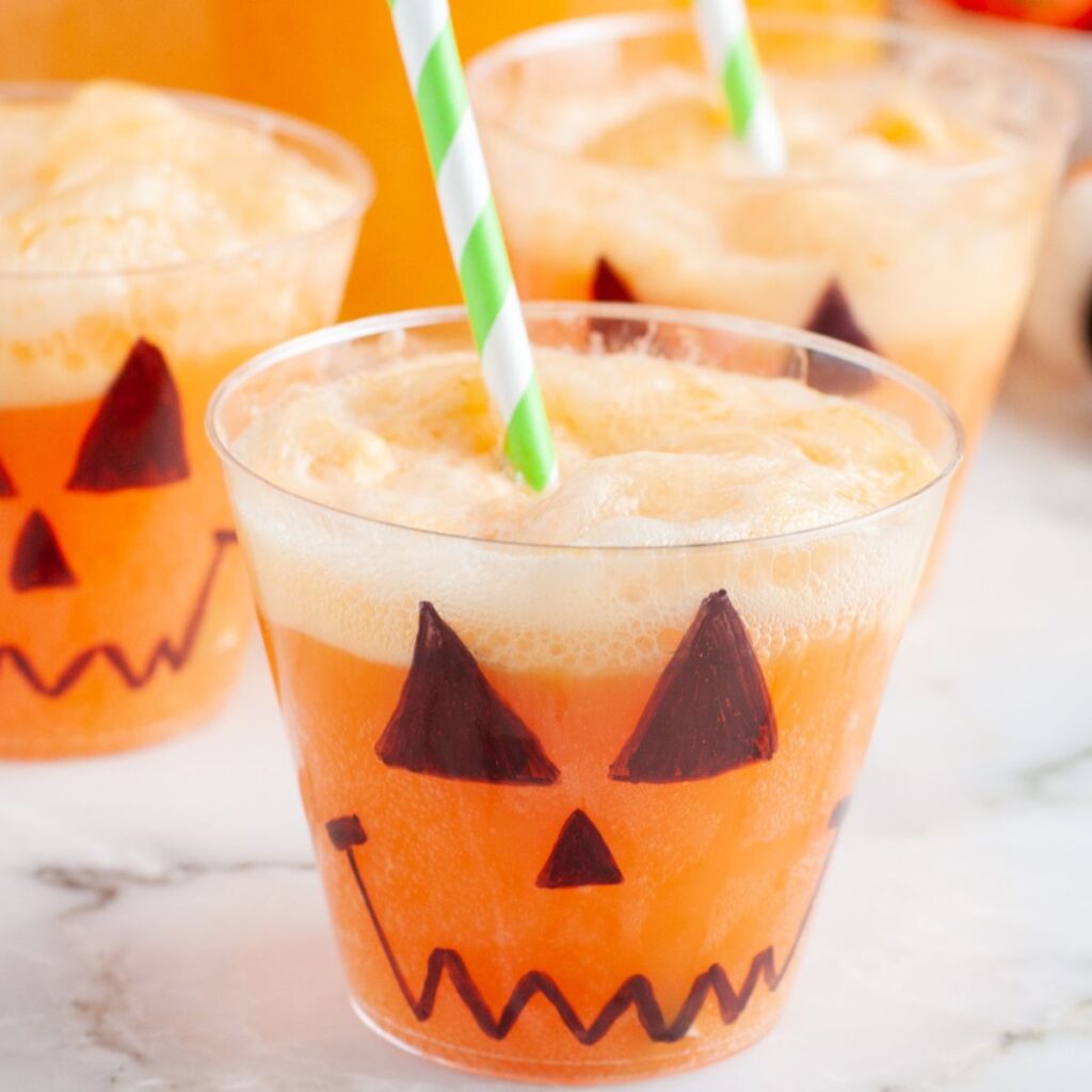 Cup with fanta halloween punch.