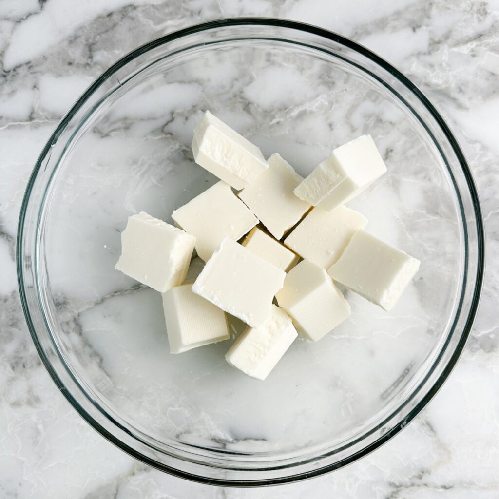 Almond bark broken up in a bowl. 