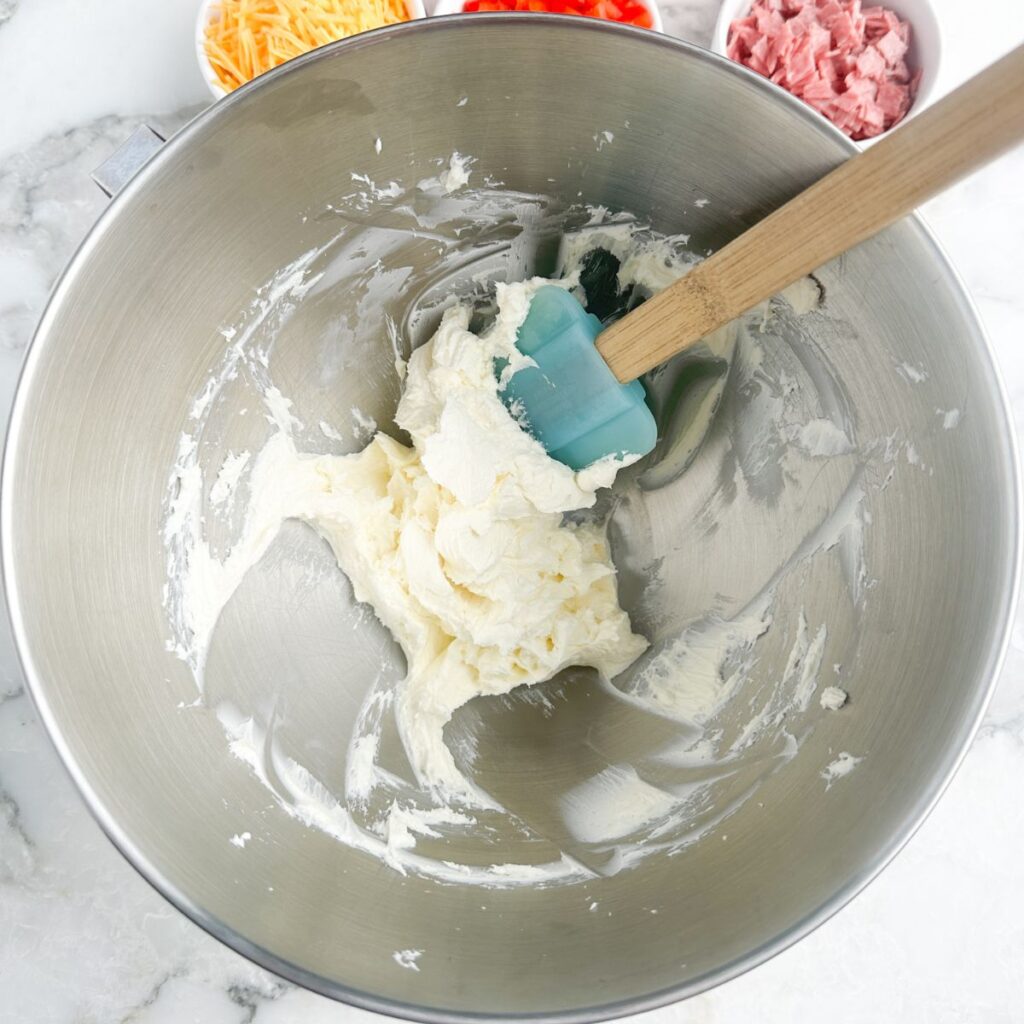 Mixing bowl with cream cheese.