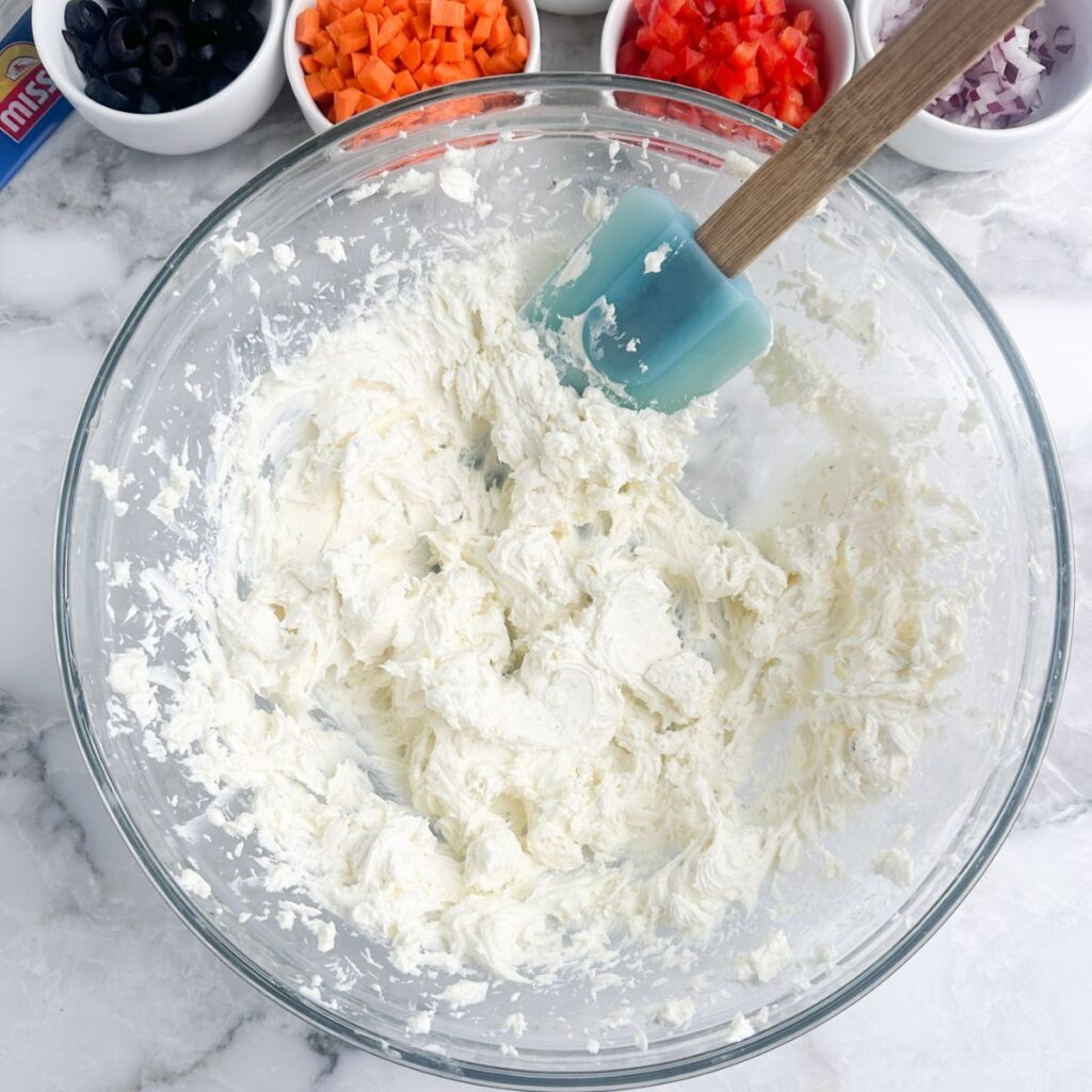Bowl of mixed cream cheese.