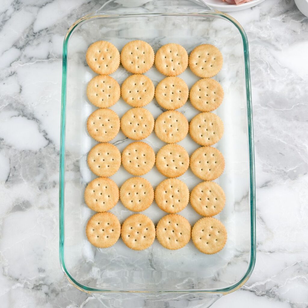 Ritz crackers in a baking dish.
