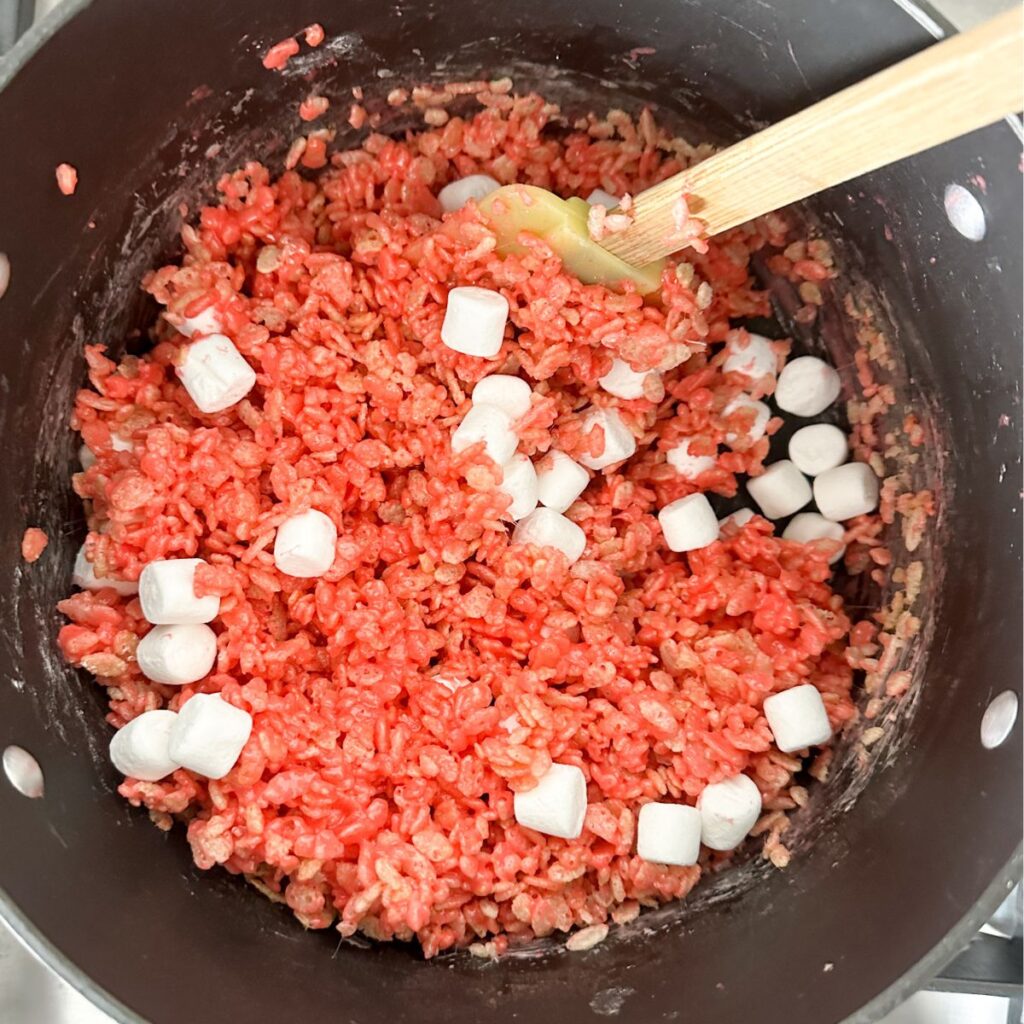 Pot with pink rice krispie treats.