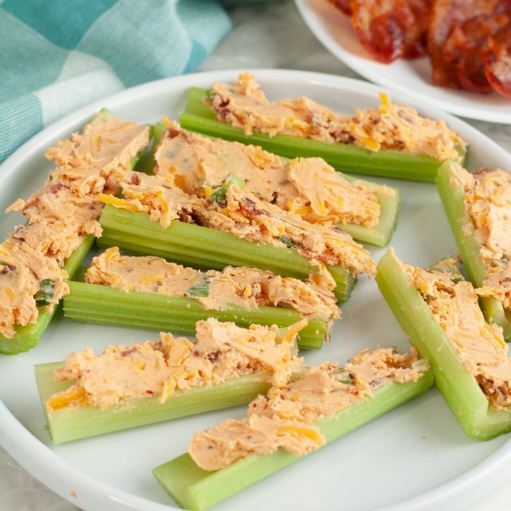 Stuffed celery on a plate. 